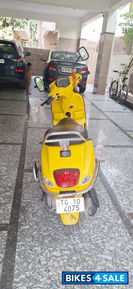 Yellow Vespa SXL 125