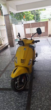 Yellow Vespa SXL 125