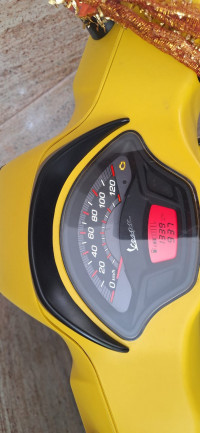 Yellow Vespa SXL 125