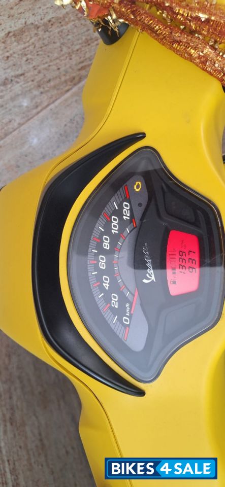 Yellow Vespa SXL 125