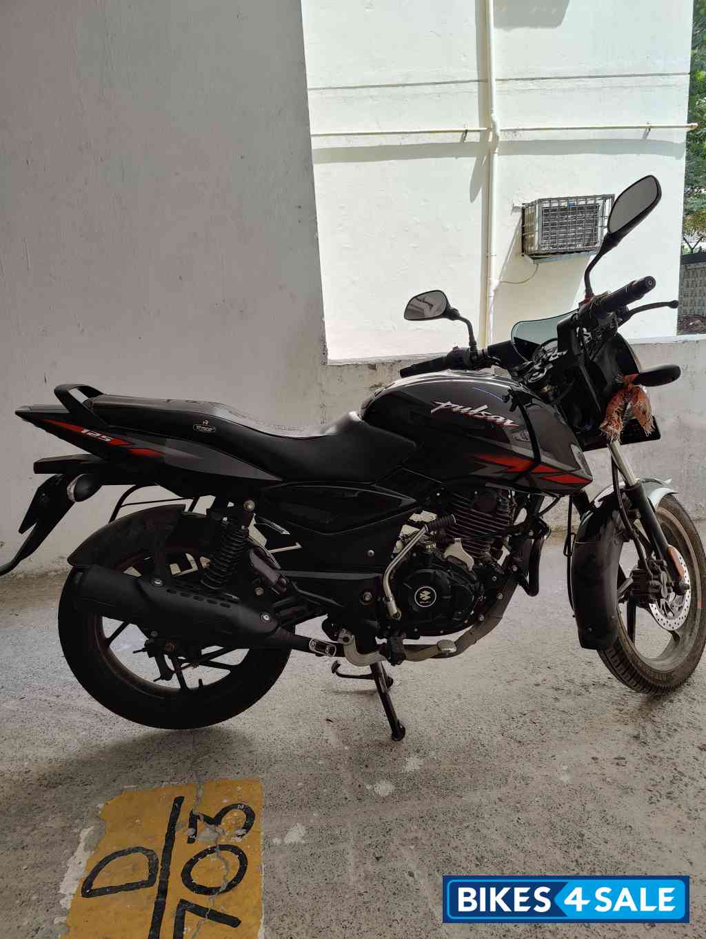 Ebony Black Solar Red Bajaj Pulsar 125 Neon Disc Single Seat