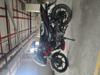 Black And Red Bajaj Pulsar 150 Twin Disc