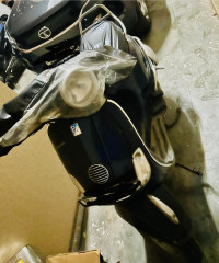 Blue Vespa VX 125