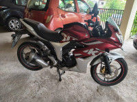 Candy Red Suzuki Gixxer SF