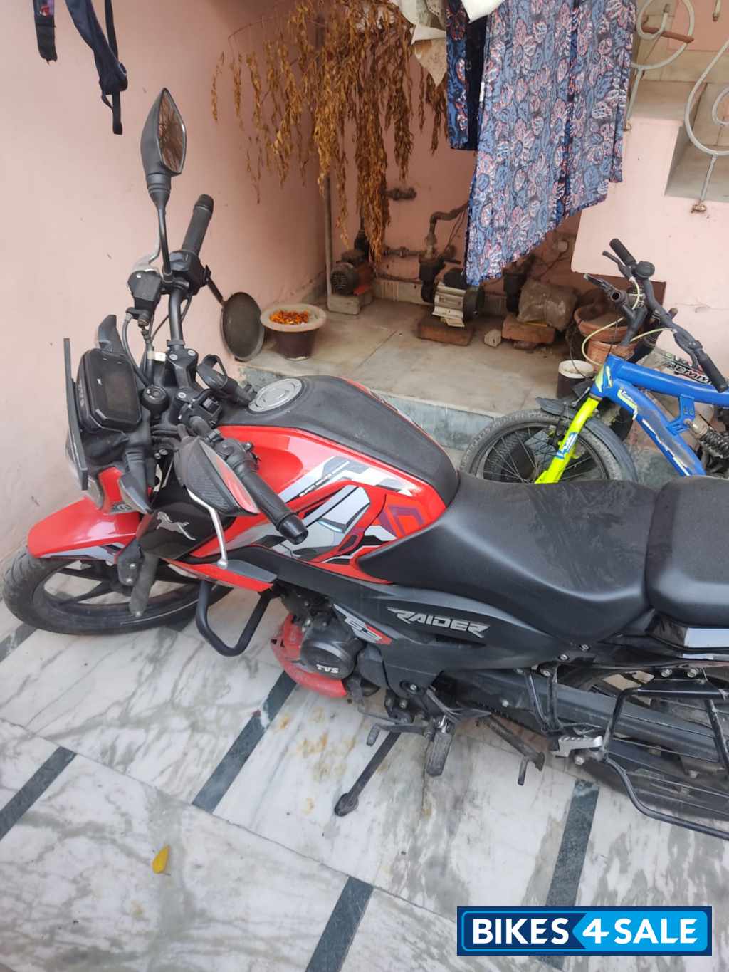 Red TVS Raider Iron Man Edition