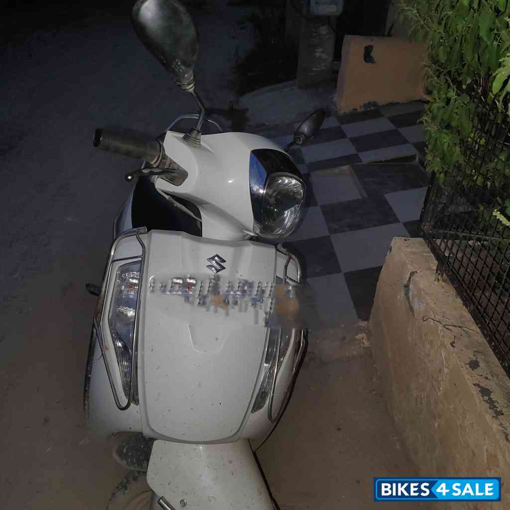 White Suzuki Access 125