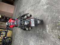 Pearl Black/red Mahindra Mojo 300 ABS BS6