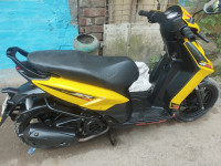 Yellow Aprilia SR 125