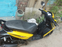 Yellow Aprilia SR 125