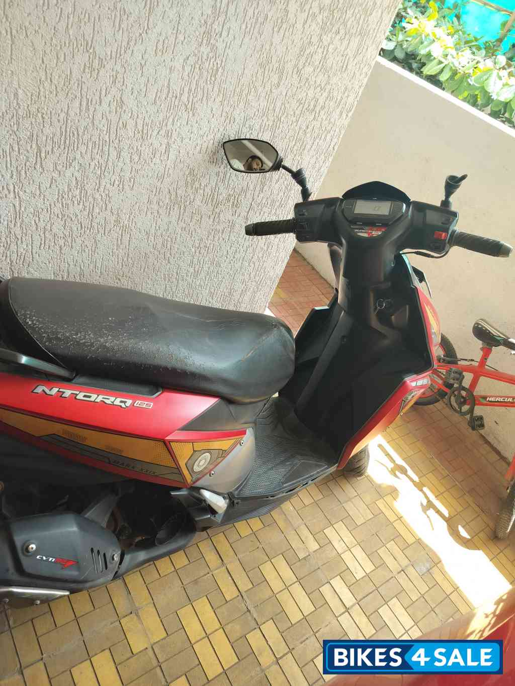 Red TVS NTORQ Super Squad Edition