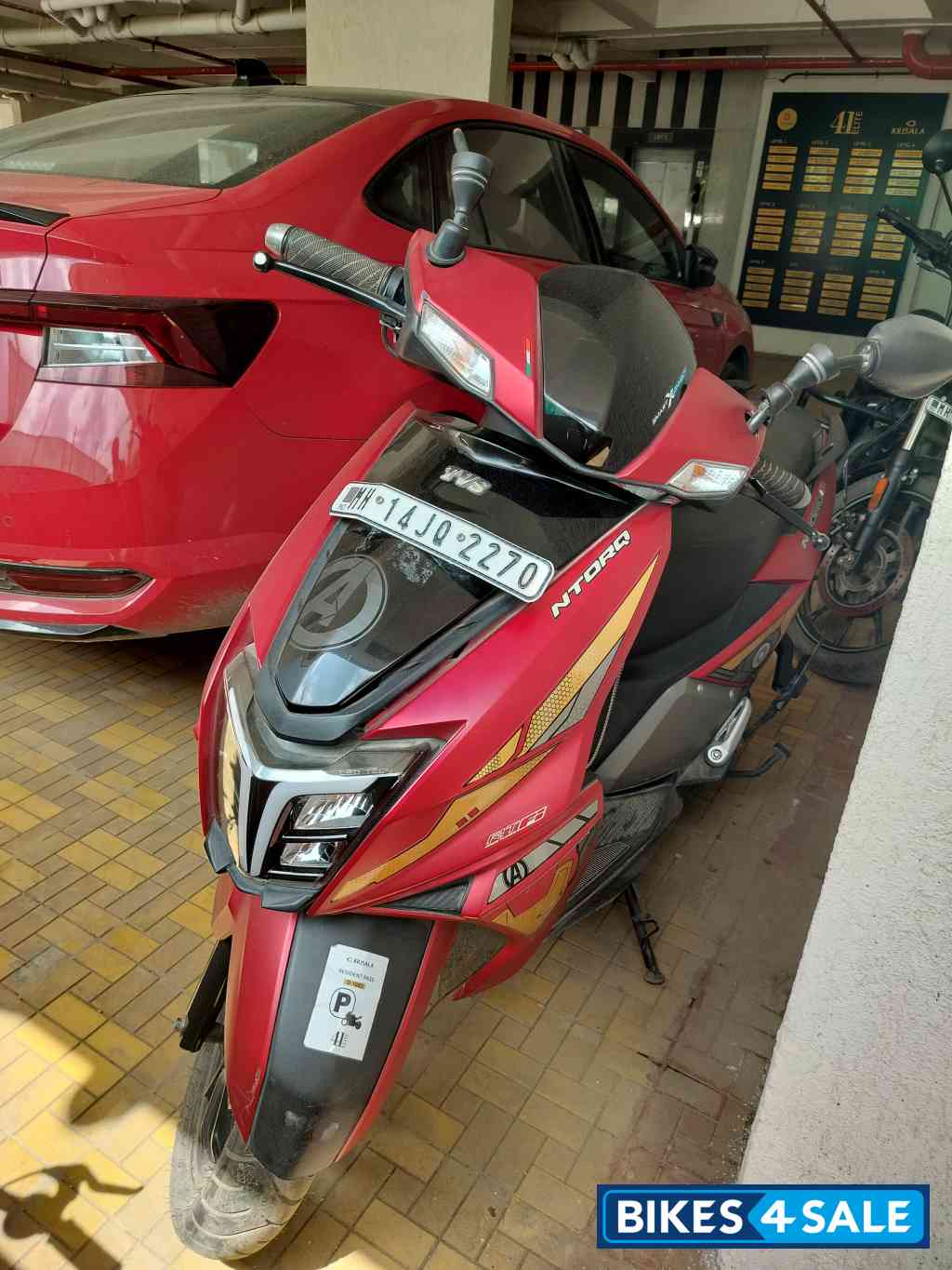 Red TVS NTORQ Super Squad Edition