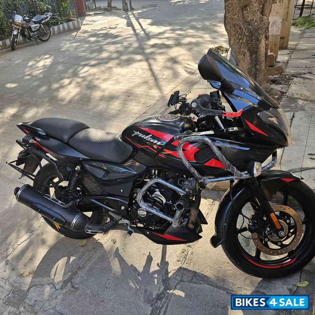 Black And Red Bajaj Pulsar 220 DTSi