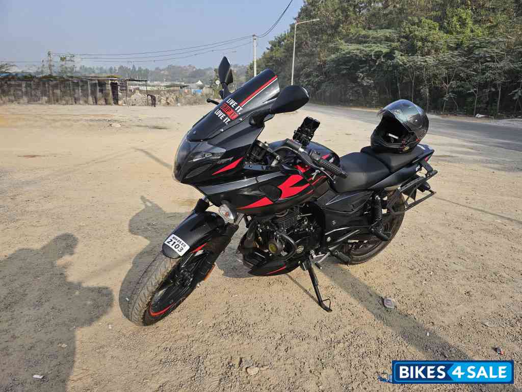 Black And Red Bajaj Pulsar 220 DTSi