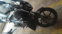 Black TVS Raider 125 Marvel Super Squad Edition
