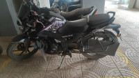 Black TVS Raider 125 Marvel Super Squad Edition