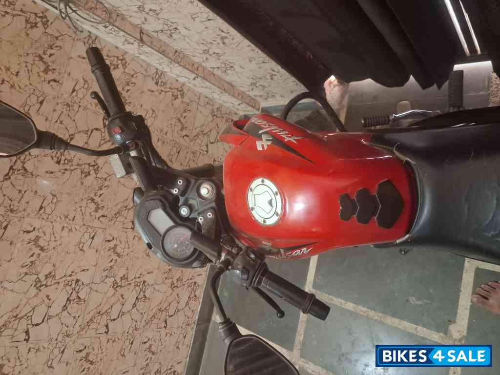 Red Bajaj Pulsar 135LS