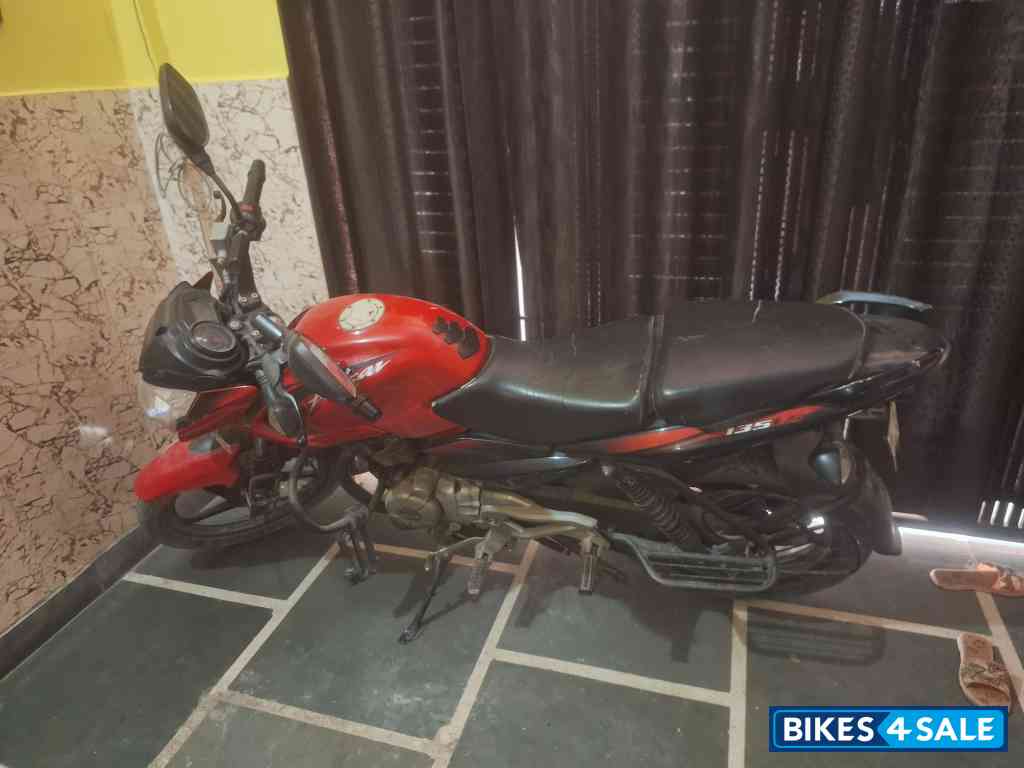 Red Bajaj Pulsar 135LS