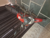 Red Bajaj Pulsar 135LS