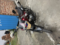 Red And Black Bajaj V12