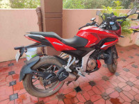 Red Bajaj Pulsar 250