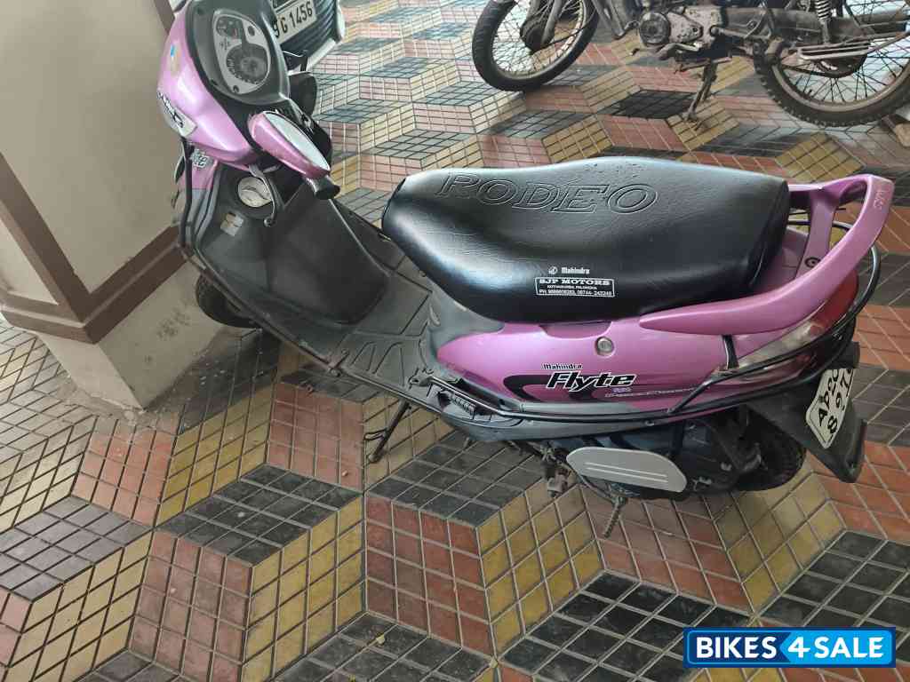 Pink Mahindra Flyte