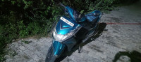 A Blue Yamaha Ray Z