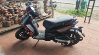 Black & Red Aprilia SR 160