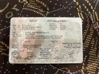 Black Bajaj Discover 100T