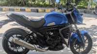 Blue Mahindra Mojo UT 300