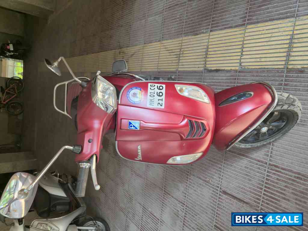 Red Vespa SXL 150 BS6