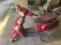 Red Vespa SXL 150 BS6