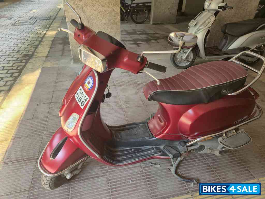 Red Vespa SXL 150 BS6