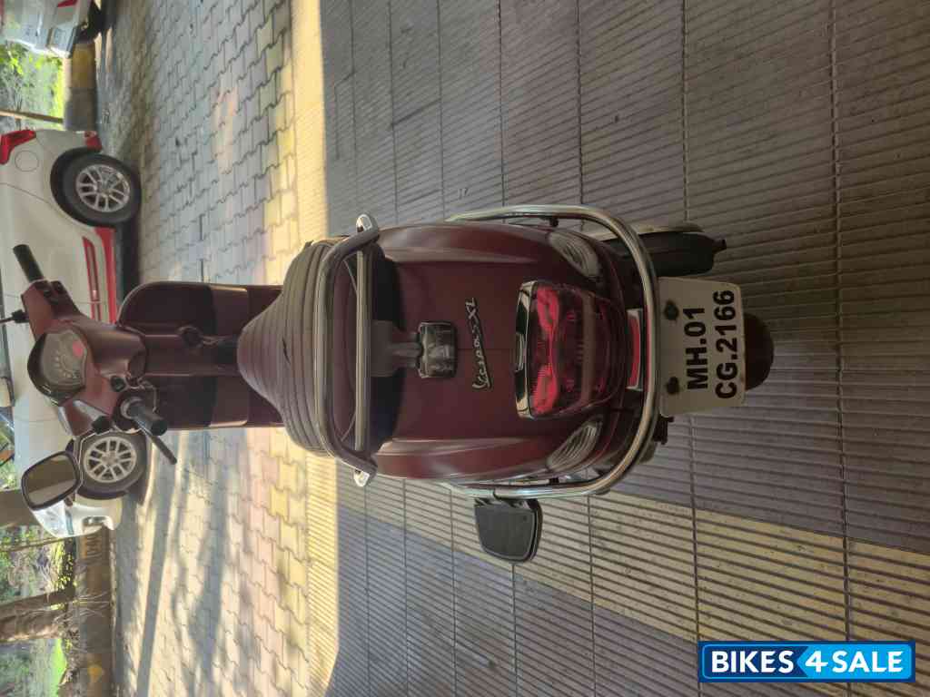 Red Vespa SXL 150 BS6