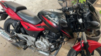 Red And Black Bajaj Pulsar 180