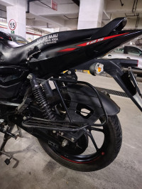 Ebony Black Solar Red Bajaj Pulsar 125 Neon Disc Single Seat