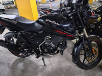 Ebony Black Solar Red Bajaj Pulsar 125 Neon Disc Single Seat