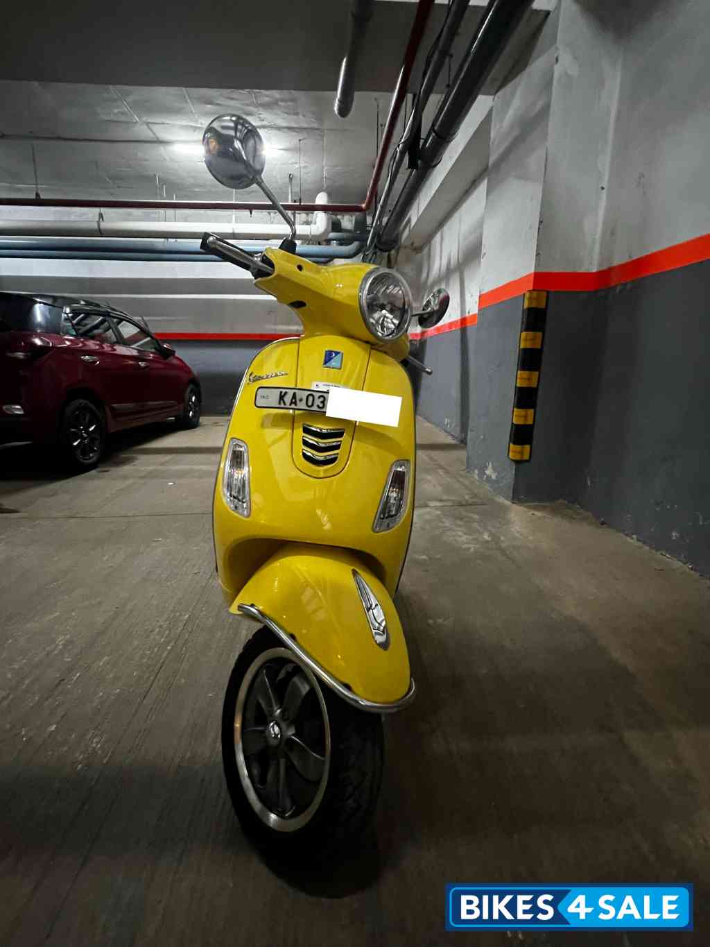 Yellow Vespa VXL 150