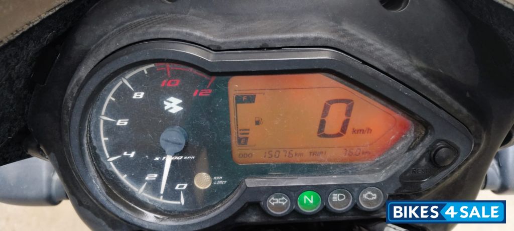 Black-orange Bajaj Pulsar 125