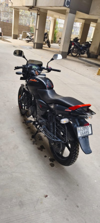 Black-orange Bajaj Pulsar 125