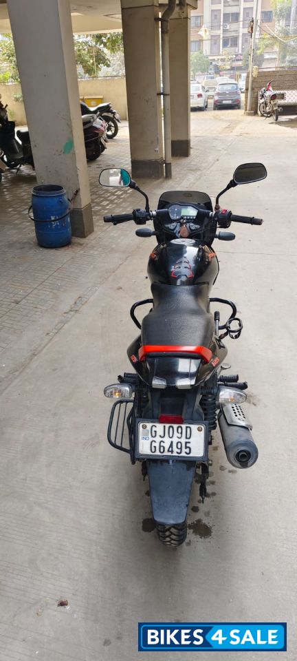 Black-orange Bajaj Pulsar 125