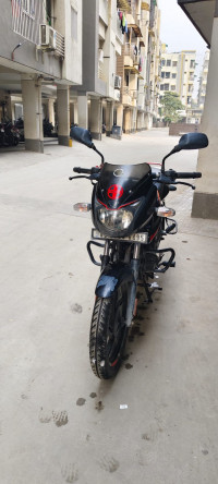 Black-orange Bajaj Pulsar 125