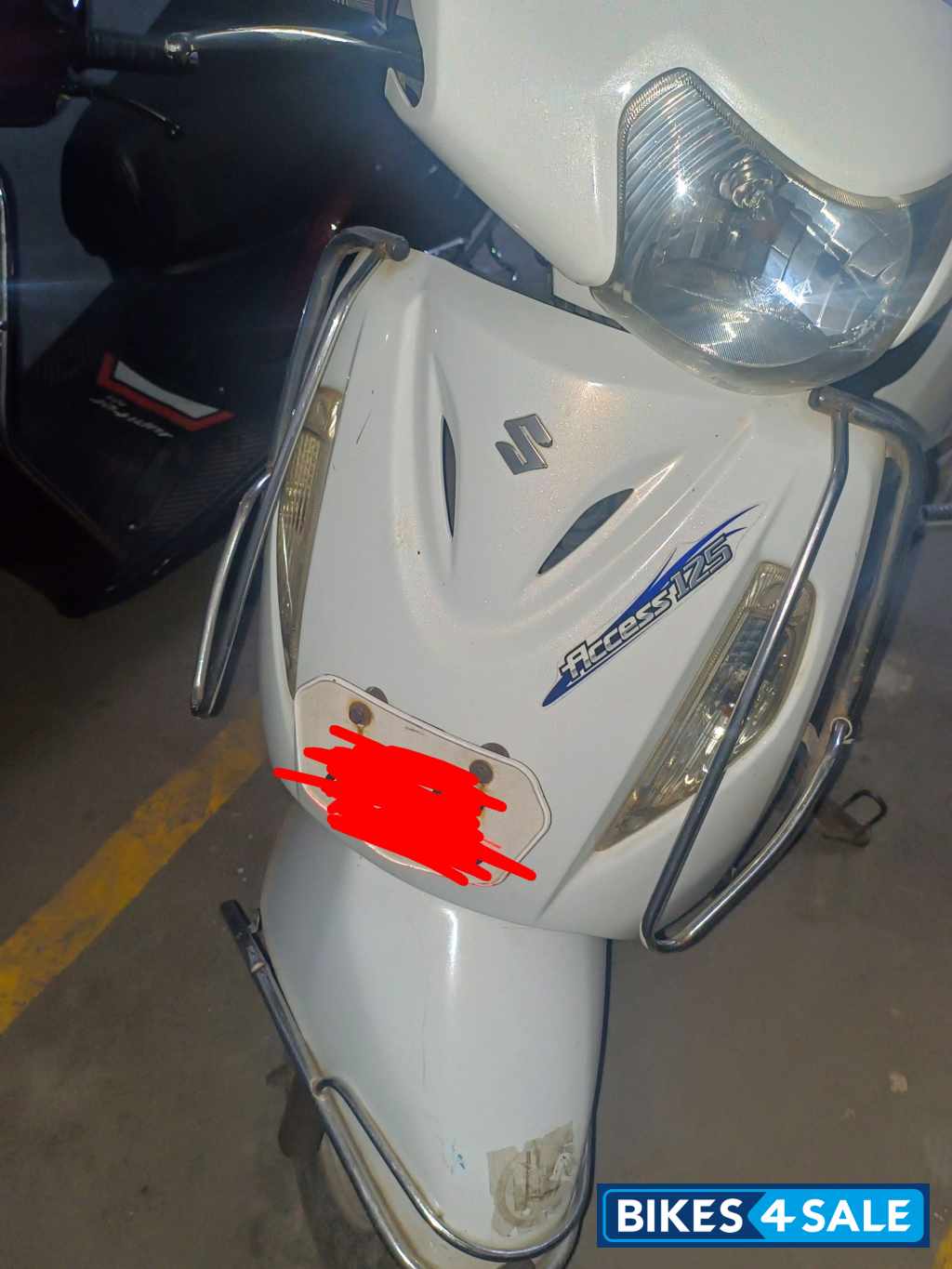 White Suzuki Access 125