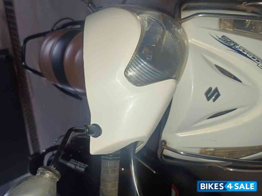 White Suzuki Access 125