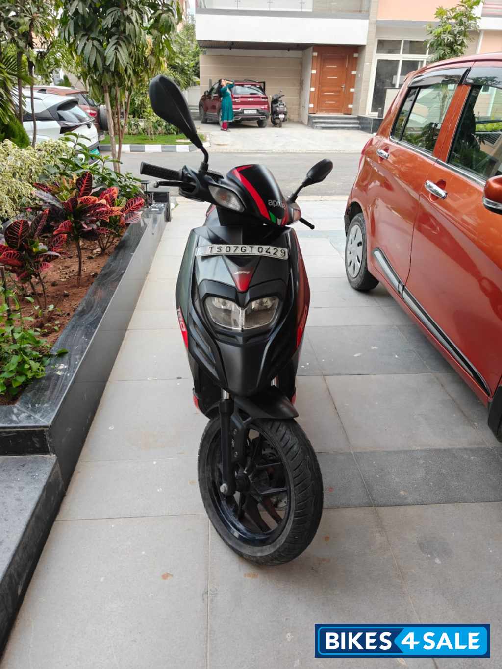 Black Aprilia SR 150