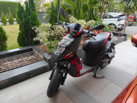 Black Aprilia SR 150