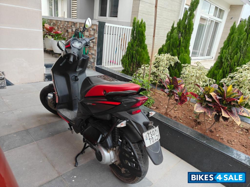 Black Aprilia SR 150