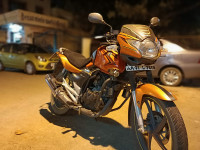 Orange Suzuki GS 150R