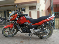 Orange Suzuki GS 150R
