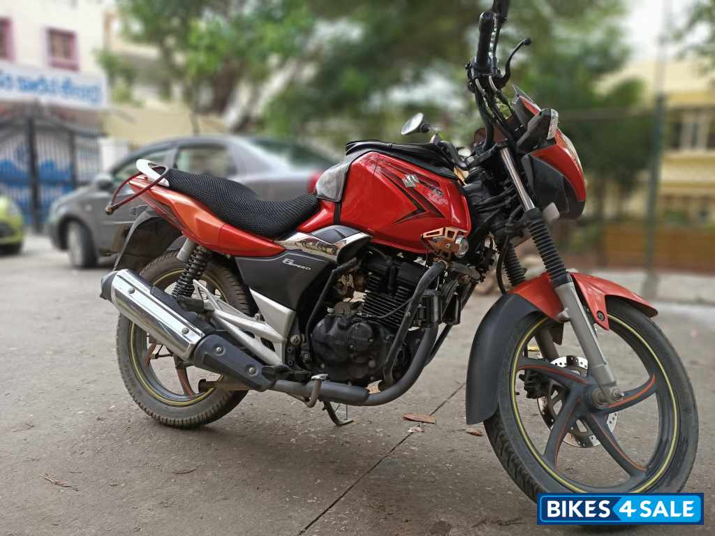 Orange Suzuki GS 150R