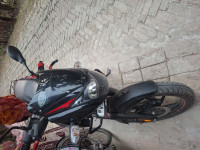Red Bajaj Pulsar 125 Carbon Fibre Disc Single Seat